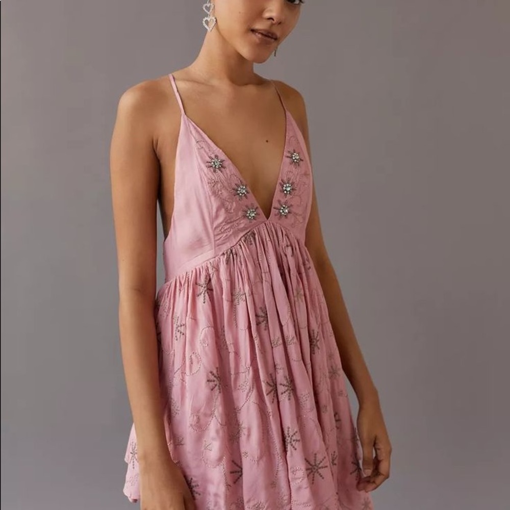Embroidered, beaded, sequin plunging, backless mini dress.